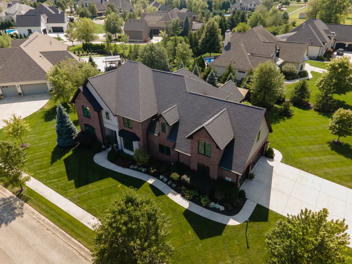 Architectural shingles with ridge vent before restoration in Hamilton County, IN